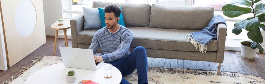 business man using HP laptop at home